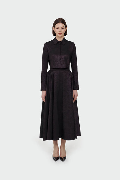 Elegant champagne two-piece set featuring a structured top and a flowing A-line skirt. 9175