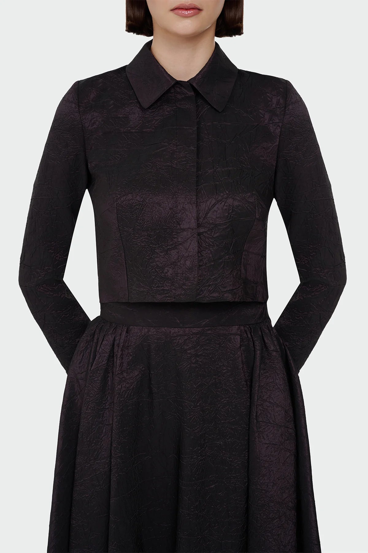 Elegant champagne two-piece set featuring a structured top and a flowing A-line skirt. 9175