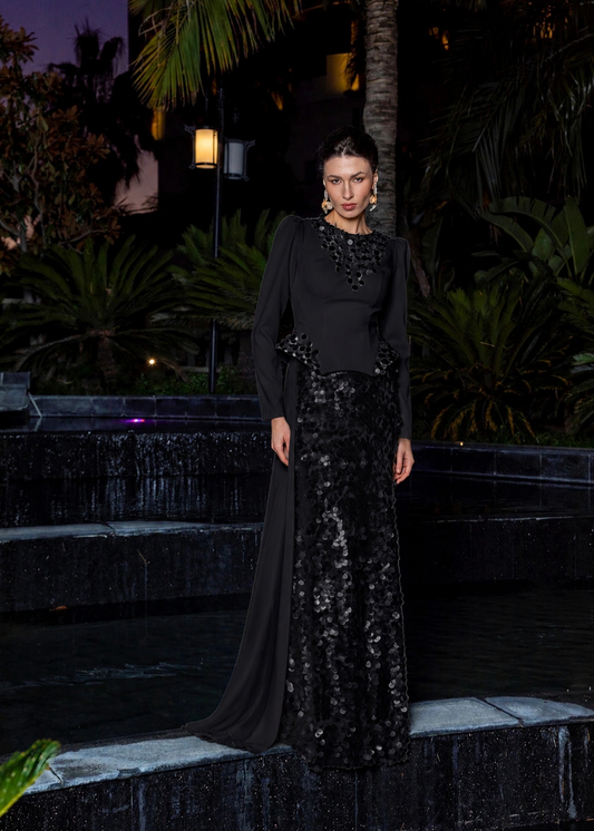 Elegant crepe gown adorned with 1997