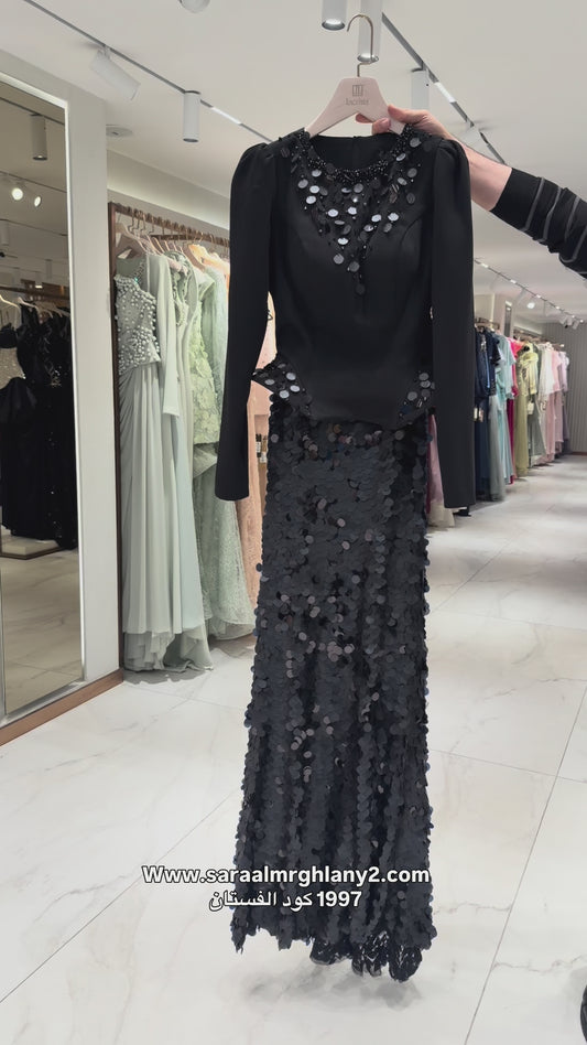 Elegant crepe gown adorned with 1997